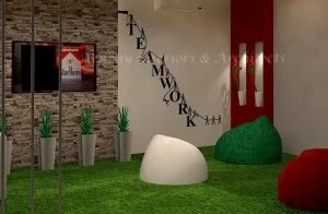 Modern office interior with artificial grass flooring, decorative seating, wall art, and stylish lighting.