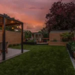 sun set and artificial grass back yard garden.